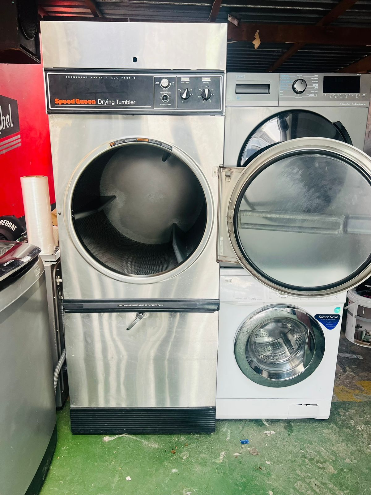 Refurbished washing machine cycle test at Kuilsriver workshop